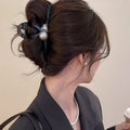 Black Sculptural Loop Hair Claw With Pearl Like Orb And Clear Crystal view 2