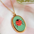 Apple Slice And Ladybug Pendant Necklaces In Gold Tone Metal view 6