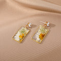 Gold Tone Rectangular Pressed Daisy Resin Stud Drop Earrings view 3