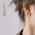Gold Irregular Twisted Hollow Square Stud Earrings view 1