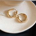 Gold Tone Smooth Interlocking Rounded Double Hoop Earrings view 5