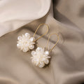 White Translucent Petal Ball Gold Tone Hook Earrings view 6
