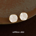 Irregular Round Cream Swirl Enamel Stud Earrings Gold Rim view 1