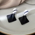 Silver Rippled Oval and Black Diamond Dangle Earrings view 2