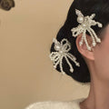 White Pearl Beaded Bow Duckbill Hair Clip Silver Ornate Top view 2