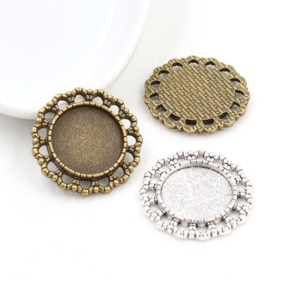Openwork Oval Cabochon Pendant Bases in Two Finishes shown in a grouped front view