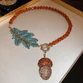 Amber Bead Necklace Teal Leaf Acorn Rhinestone Toggle view 6