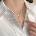 Gold Tone White Pearlescent Butterfly And Heart Lariat Necklace view 1