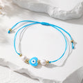 Cord and Pearl Accent Heart Evil Eye Bracelets in Nine Colors view 10