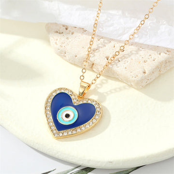 Gold Tone Blue Heart Evil Eye Pendant Necklace