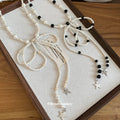 Beaded Bow Tie Necklace With Star Charms In Two Colorways view 2