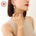 Gold Huggie Hoop Freshwater Pearl Drop Earrings Pair view 3