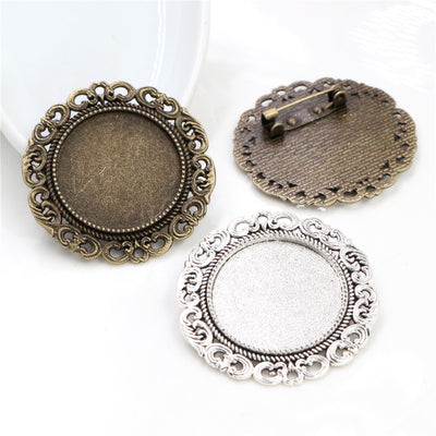 Front view of scrollwork brooch bezel blank finish options