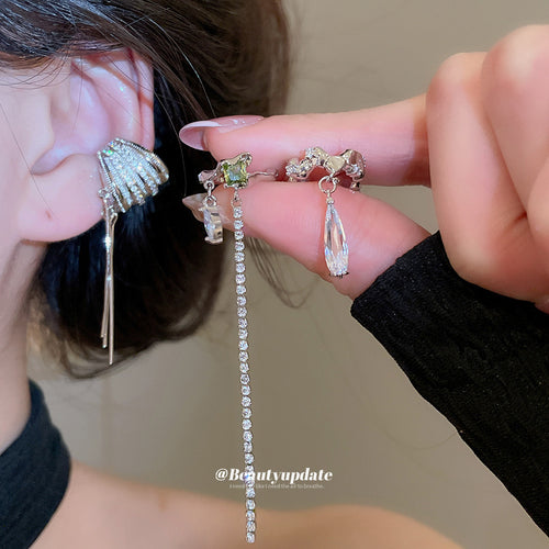 Model wearing the silver crystal ear cuff drop earrings fashion jewelry accessory
