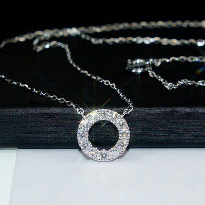 Front sparkle shot of silver pave CZ open circle pendant necklace