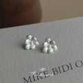 Matte Silver Flower Stud Earrings Small Pearl Centers view 3