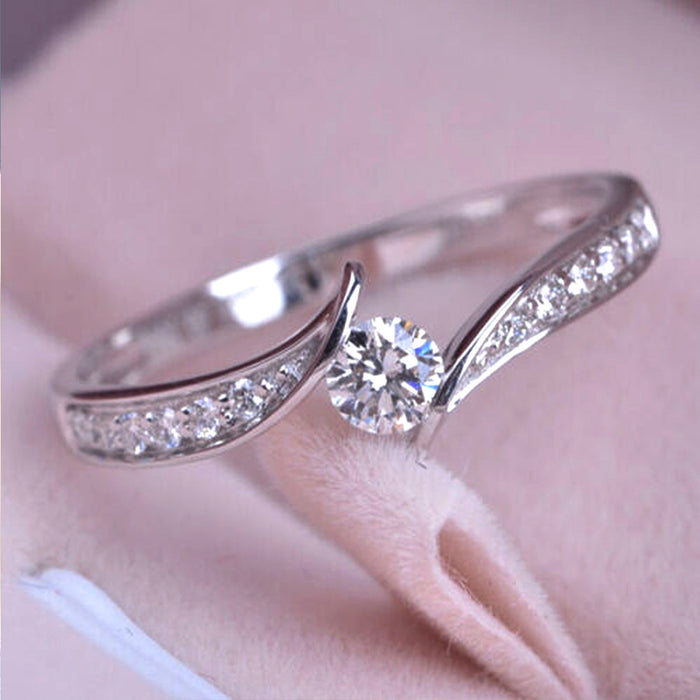 Round Clear Solitaire Curved Open Ring In Polished Silver Tone