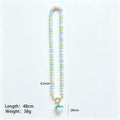 Round Bead Necklaces With Three Gold And Cream Strawberry Pendants view 7
