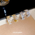Crystal Crescent Hoop Earrings in Gold and Silver Tones view 1