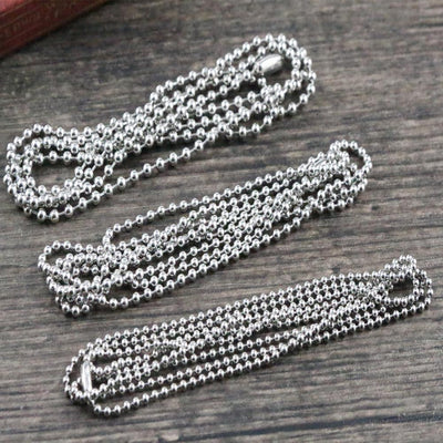 Steel ball chains showing assorted shapes and finishes