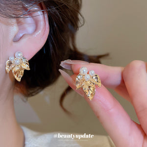 Gold Tone Leaf Stud Earrings with Pearl Accents Jewelry Design