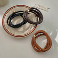 Wrapped Leather Look Ponytail Hair Tie In Black Or Dark Brown view 2