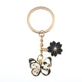 Gold Tone Butterfly Skull and Sakura Flower Clip Keychains view 6