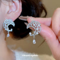 Silver Tone Crystal Crescent Earrings With Teardrop Dangles view 1