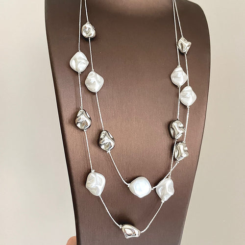 Close view of the colors and surface details on double strand irregular pearl necklace