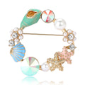 Gold Tone Seashell Starfish Circle Brooch Pearls AB Stones view 1