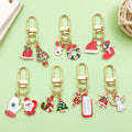 Christmas Charm Keychains Featuring Santa Across 45 Pictured Variations view 1