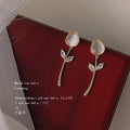 Gold Tone Tulip Drop Earrings Cream Cat Eye Stem Leaves view 1