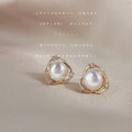 Gold Tone Crossed Circle White Pearl And Clear Stone Stud Earrings view 6
