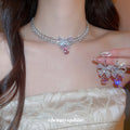 Silver Tone Crystal Bow Necklace And Earrings Set With Pink Drops view 3