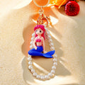 Pearl Loop Mini Mermaid Keychains in Three Sitting and Reclining Poses view 3