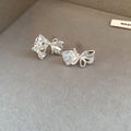 Crystal Bow Stud Earrings in Gold and Silver Tones view 7