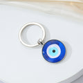 Round Blue Evil Eye Cord Necklace and Split Ring Keychain view 3