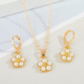 Gold Tone Faux Pearl Flower Pendant Necklace and Huggie Earrings view 3