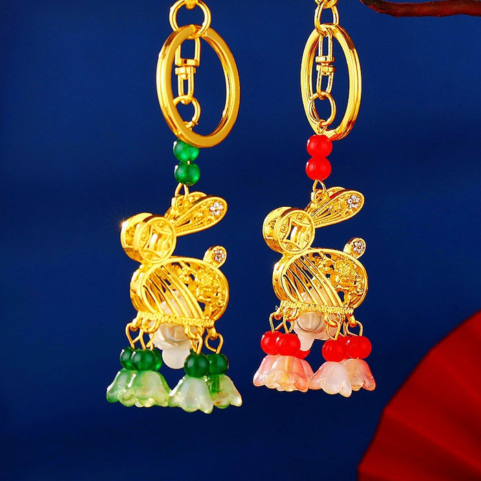 Illuminated Rabbit Keychains With Red or Green Floral Bead Tassels