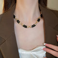 Gold Cross Link Enamel Segment Choker Black White Pair view 3
