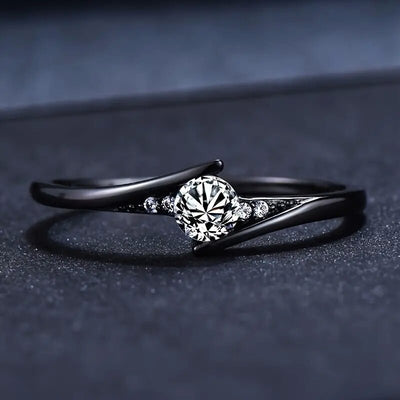 Product view showing round solitaire curved split ring