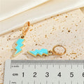 Gold Tone Enamel Lightning Bolt Huggie Drop Earrings in Six Colors view 2