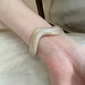 Brown Segmented Closed Bangle And Nine Wavy Open Resin Cuffs view 7