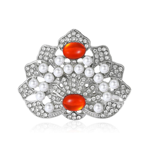 Silver pearl floral brooch with red oval cabochons front