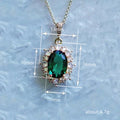 Green Oval Solitaire Halo Pendant Necklace In Gold Tone view 4