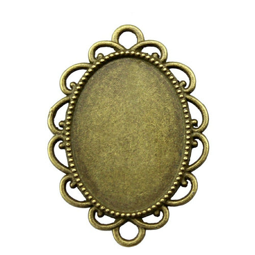 Round Loop Oval Cabochon Connector Trays in Two Finishes shown in image 1 with rounded loops and rings at both ends