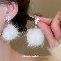 White Faux Pearl Snowflake Pom Pom Drop Stud Earrings view 1