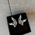 Silver Hollow Butterfly Wing Stud Earrings Abstract Pair view 3