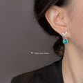 Silver Whale Tail Blue Glass Teardrop Drop Earrings Pair view 2
