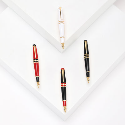 Front view of miniature capped fountain pen with enamel barrel and gold tone trim